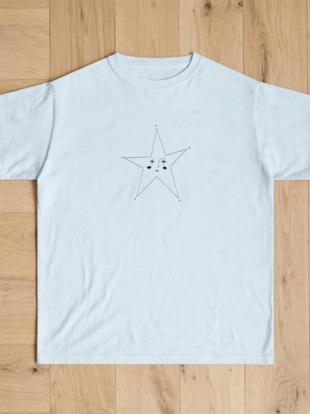 Cute Star Face Light Blue T-Shirt Minimalist Line Art.
